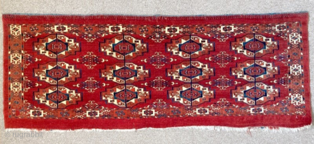 Early 19th century Tekke torba, with immaculate colours. Some good near invisible restoration in top left corner. 1.13m by 0.41m             