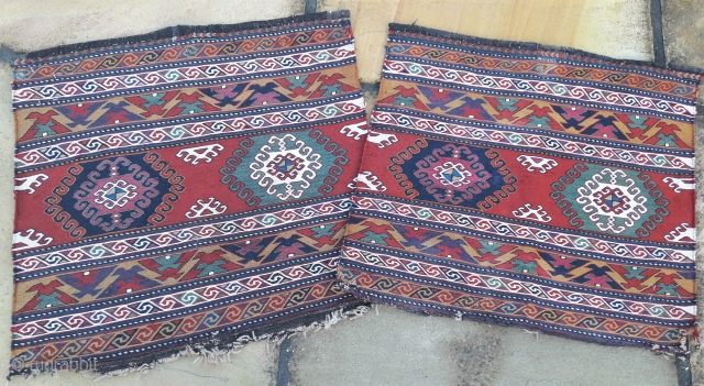 Pair of early 20th century Caucasian mafrash end panels, stunning saturated colours,
and very fine weave. Quality items, each 22in by 20in Small ares of reweave (see detail pics)     