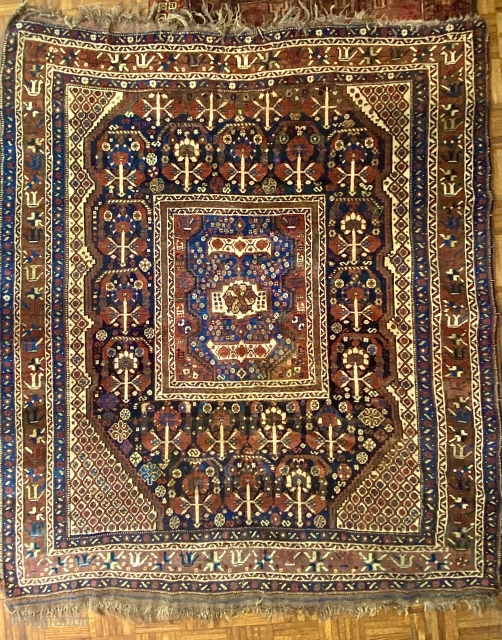 Qashqai rug, ca. 1880-1890, 6’4” x 5’4”/ 193 x 163 cm.

Very nice condition-see photos, flower-inhabited botehs on indigo field, with 
diagonal grid of diamond shaped flowers at spandrels and sides. A rectangular  ...