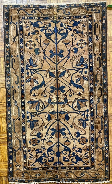 Hamadan Rug, ca. 1900 3’6” x 6’ / 107 x 183 cm.

Magnificently proportioned plant-forms, scrollwork, in

indigo, dark green, dark ivory, and pale brown on a tan

field.  Elegant long “s” shapes in  ...