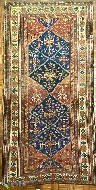 Kurdish/ Loori small carpet/ large rug, ca.1890; 5’8” x 11’0” / 68 x 335cm.

Beautifully drawn field and border motifs, including those of four women, each individual, set amongst two large indigo   ...