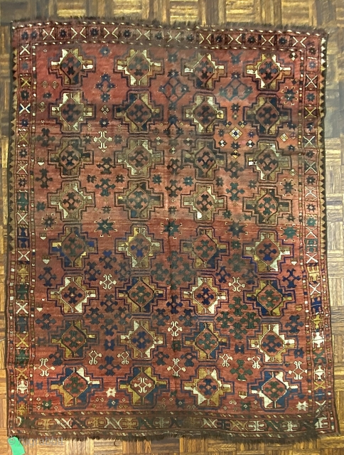 Uzbek Small Carpet or Large Rug, ca. 1890; 4’8” x 12’6”

Overall pattern of Chuval-gul variants with fluidly rendered totemic 

figures between.

Small areas of wear, tiny areas of repiling-please study photos carefully  