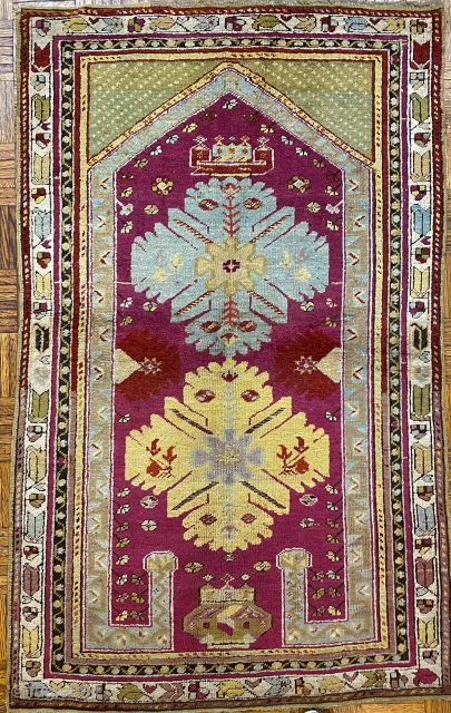 Kirshehir Turkish Prayer Rug, ca. 1890; 3’ 5” x 5’ 4” / 104 x 163 cm

Re-entrant prayer rug with cochineal field with some madder red and

fuchsine details. Two large “snowflake” medallions, plus  ...