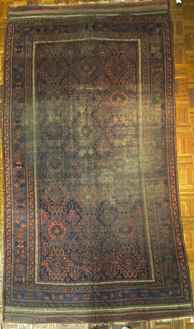 Antique Sangtchuli Baluch Carpet, ca. 1870; 5’10” x 10’8” / 178 x 325 cm

Possessing 21 twenty-lobed medallions, possibly variants of what is known by some

collector as Harshangs, this weaving is very powerful  ...