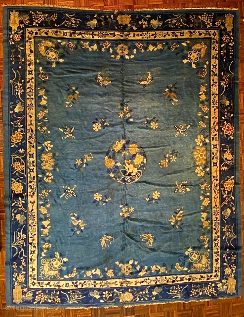 Antique Peking Chinese Carpet, ca.1900; 8’4” x 9’9” / 254 x 297 cm

Medium blue ground with a charming image of a cat stalking a butterfly within a medallion. Further well 

proportioned butterflies  ...