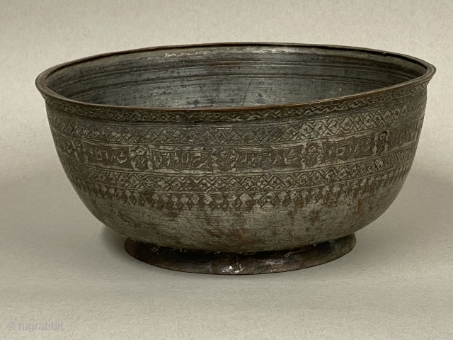 Antique Tinned Copper Bowl, ca. 19th Century or earlier;

Height: 4 3/4” // 12.1 cm; Diameter: 8 1/4” // 21 cm; Base diameter: 6 3/8” // 16.2 cm

Decorated with scribed bands of triangles  ...