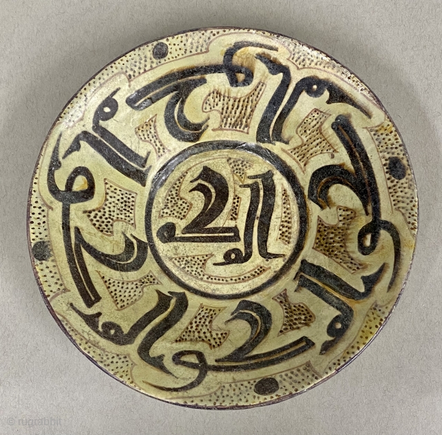 Nishapur Calligraphic Ceramic Bowl, ca. 9th-10th Century

Diameter: 8” //  30.5 cm

Height: 2 3/8” // 6 cm

Diameter Base: 3 1/2” // 9 cm

Interior decorated with Naksh Arabic script ( Kufic ) characters  ...