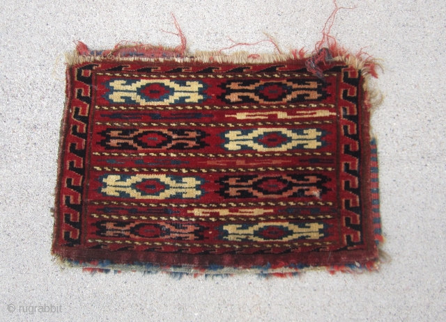 Turkoman..... knotted , small Yomud bag.....Late 19th C......vegetal dyes .....complete w/ back....condition as shown.....
12" x  17"  ( 30cm x 44cm )          