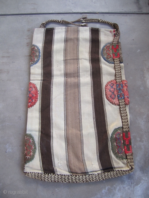 Karapinar Cargo / Grain Storage bag.....Konya area in Central Anatolia....
1st half 20th C...all wool with plaited strap and felt 'grips '..... 2' x 3'4" (60cm x 100cm )....very good condition with some  ...