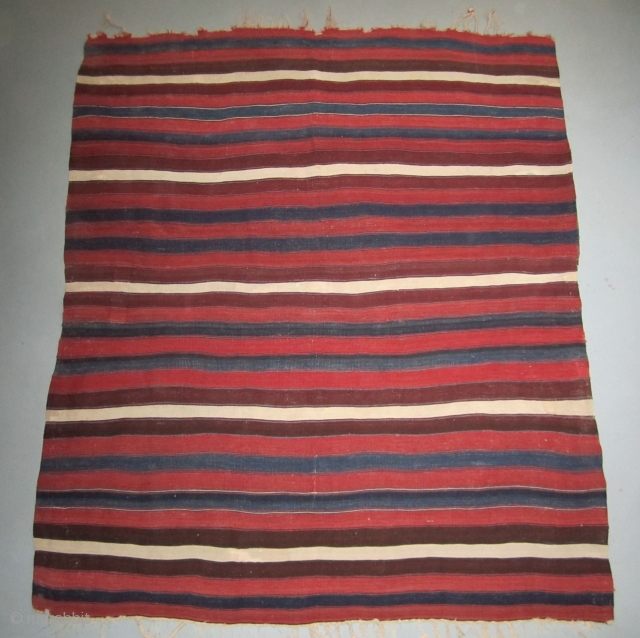Northwest Anatolian kilim fragment....Balikshir/Bergama area....circa 1875....
lovely vegetal dyes and wool....4'10" x 5'8" ( 147cm x 173cm ) with cording and plaited tassels on one end and selvedges on both sides...condition as shown. 