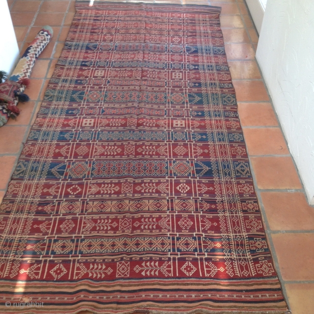 Nushki Belouch kilim-(bedding cover) c 1900 @ 5' x11'  vegetal dyes madder, indigo, turmeric and even the violet tones (madder overdyed w/ indigo)interesting local mordants.  pattern wefts floating on reverse.Selvedges  ...