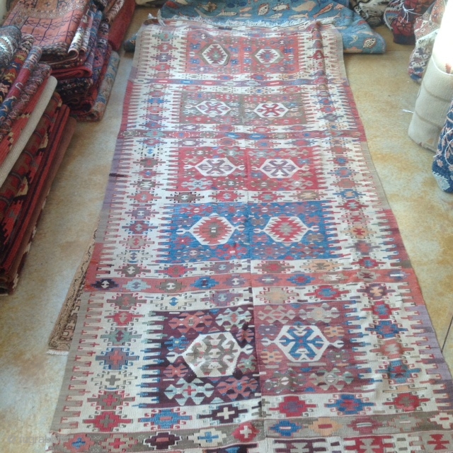 Turkish kilim mid 19c. 5'x11" two sections pretty well matched,  good pastel colors including a wonderful old purple.  significant restoration professionally done many years ago, good color match but wool  ...