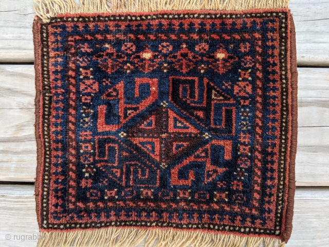 Antique Baluch chanteh. 10" x 12". Beautiful colors and tight knots. Couple small moth bites otherwise full pile.               