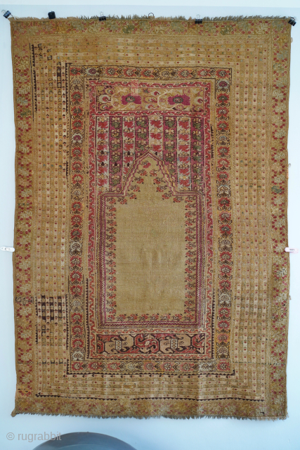 Mid 19th century but likely earlier Ghiordes prayer rug. It has a few small repairs but overall mostly original. 6'0" x 4'4" or 182 x 132 cm. Please contact me at steven.malloch@gmail.com  ...