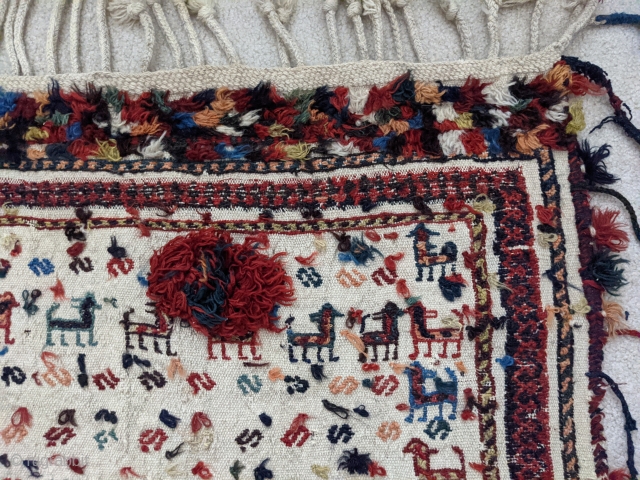 Early 1900s. Qashqai horse blanket or cover. 4ft7in x 5ft. Wonderful repeating animal figures with a few silk braids woven in here and there. A few scattered small holes but overall great  ...