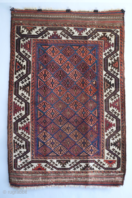 Beautiful white border Baluch rug in a small format. 3'1" x 4'7" or 94 x 140cm. Please message me for more details at: gerrerugs@gmail.com or steven.malloch@gmail.com       