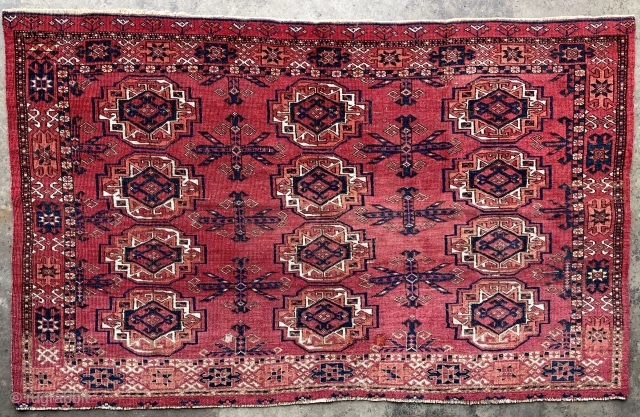 Mid 19th century Ersari / Kizilayak chuval. Beautiful cherry red field color, unusual flower minor border. 2'10" x 4'6" Two small repairs, natural colors. I took the photos in two lighting conditions,  ...