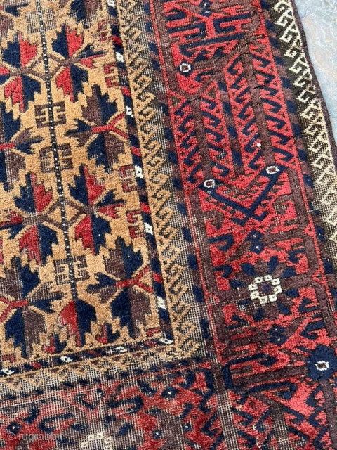 Antique camel hair Baluch rug. 3'0" x 5'2". All ends secured and much of the "wear" is from the oxidized browns. No holes.          