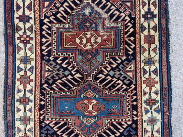 19th Century Caucasian fragment. 2'5" x 3'5" or 74 x 104cm. Beautiful colors and can still be used as a scatter rug or collectible piece as an older one. 

Cheers.   