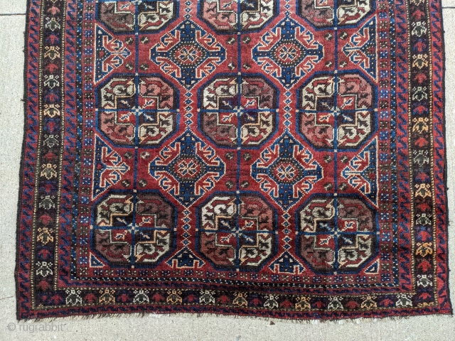 Beautiful old Baluch rug with Tekke guls. Great border, deep blue, and good pile with soft wool. 3'9" x 7' or 114 x 214cm. 

Cheers.        