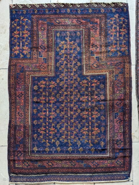 2nd half 19th century Timuri Baluch blue ground prayer rug. Very finely woven piece. There are a few well done repairs in the borders, none in the field.

3'4" x 4'8"   