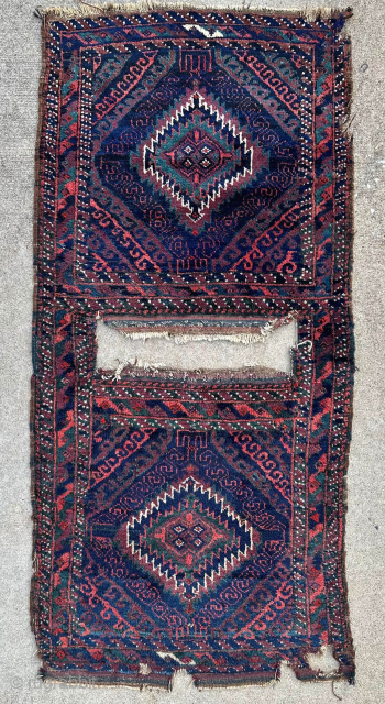 Antique Mushwani Baluch saddle bag. Glowing colors and great wool. Please contact me at steven.malloch@gmail.com or gerrerugs@gmail.com for purchase or questions.            