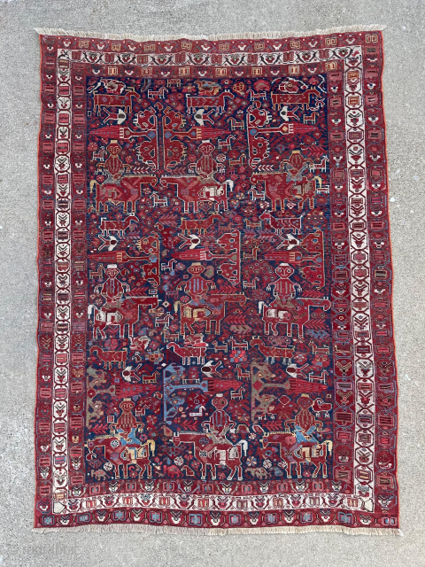 Unusual pictorial Khamseh rug with riders on horses. Wonderful piece with great colors. It has had some repiling in spots but no large repairs. 5'11" x 4'2" or 180 x 127cm. Email  ...