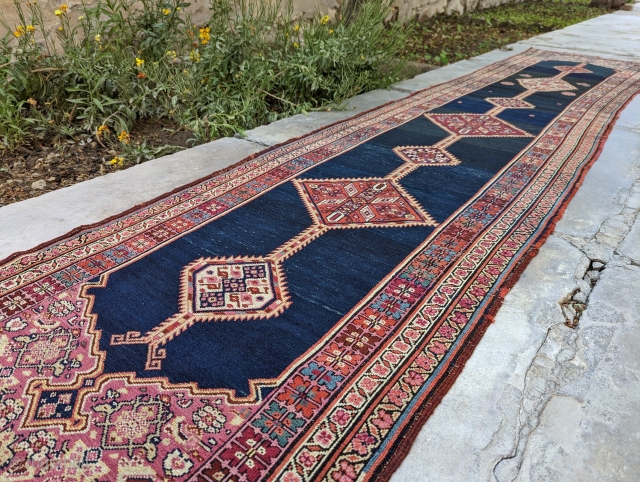 Antique, skinny Kurdish runner. It has a great deep blue field.

2'9" x 13'5" or 84 x 409cm

Please contact me at: steven.malloch@gmail.com or gerrerugs@gmail.com          