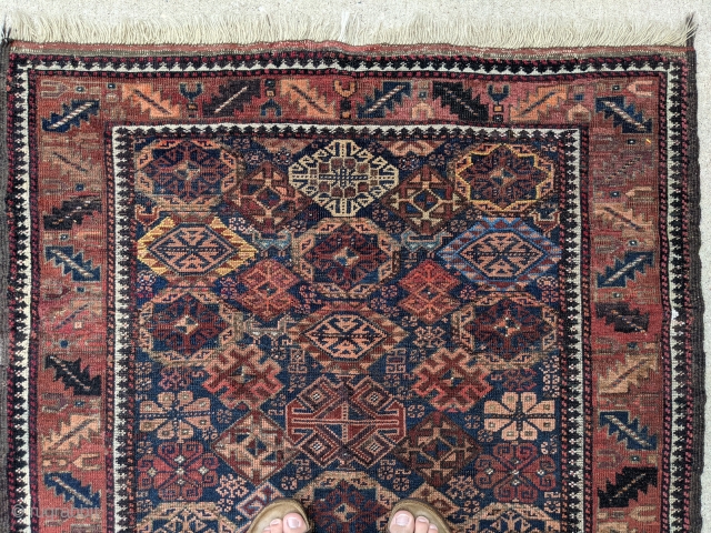 19th Century, Torbat e Haidari Baluch rug. 3'8" x 5'11". I love the double headed ducks/birds near the top. Wonderful, rare piece packed full of guls. 

Cheers.      