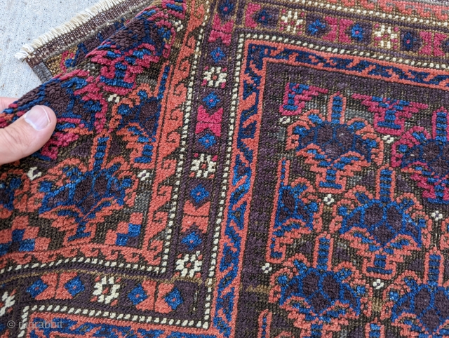 Symmetrical knotted dukhtar e qazi design Baluch prayer rug. Some cochineal, the only 4 ply wool on the piece. Natural dyes. Beautiful. 2'11" x 5'4".        