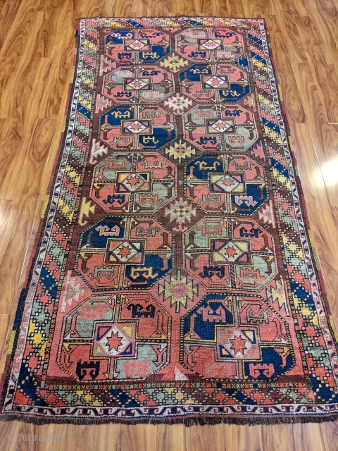 Early 1900s Uzbek / Karakalpak rug. 4'6" x 9'1". Beautiful colors and good pile. Love the multi colored selvedges. The "grey" color is actually a greyish green. 

Cheers.     