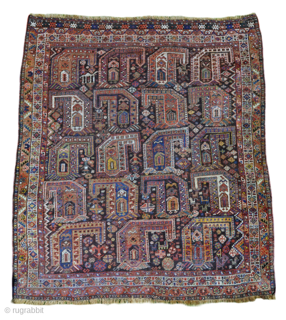 Very whimsy, old (probably) Shiraz rug. It has everything, boteh, humans, peacocks, a camel, goats, birds, etc. It has had some repiling in the lower left mostly near the borders.

5'0" x 5'6"  ...