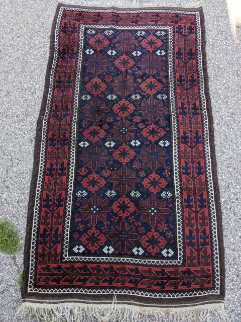 Antique snowflake Baluch rug. 3'4" x 6'5". Perfect condition as it was hung on the wall. Original goat hair selvedge and kilim ends. Soft, thick, fluffy wool.      