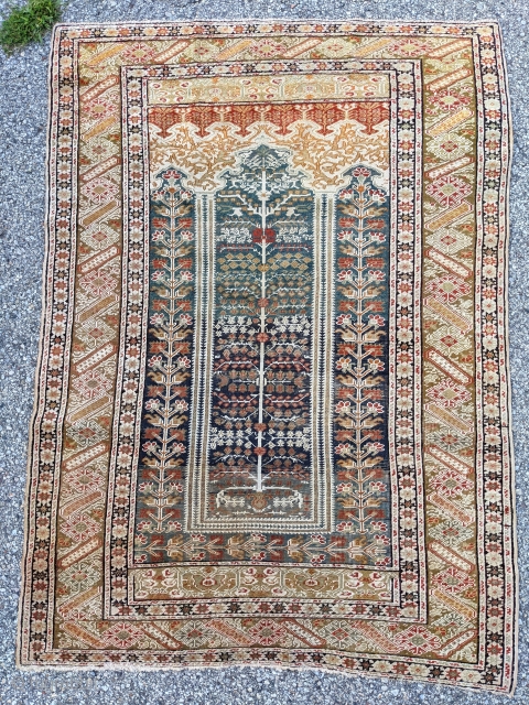 19th century NW Anatolian Bandirma prayer rug. 4'0" x 5'5". Beautiful abrash and great tealish color. It's difficult to capture the colors and wonderful apricot and yellow tones.     