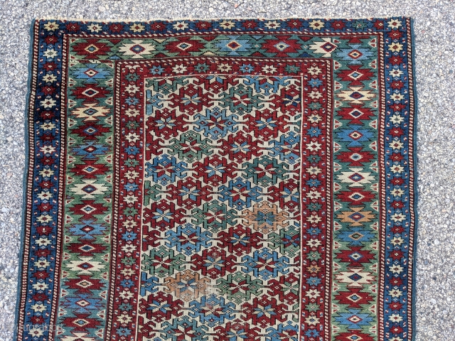 Beautiful antique Kazak rug with ample amounts of green. 3'4" x 4'5"                     