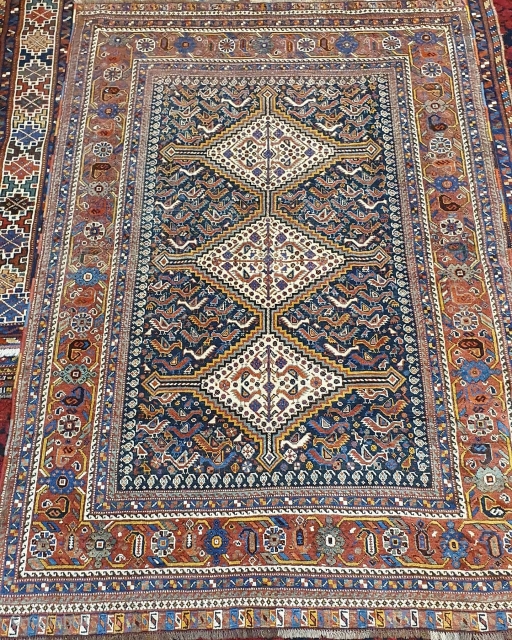 Beautiful antique Khamseh bird rug... so many birds! Great colors and very tight weave. Please, let me know if you need more information or photos. Included photos both of indoor and outdoor  ...