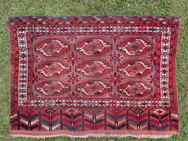 Antique Yomut chuval with complete elem. It does have a bright red. i washed it with very little color transfer but there were still some in a few spots (from a previous ...
