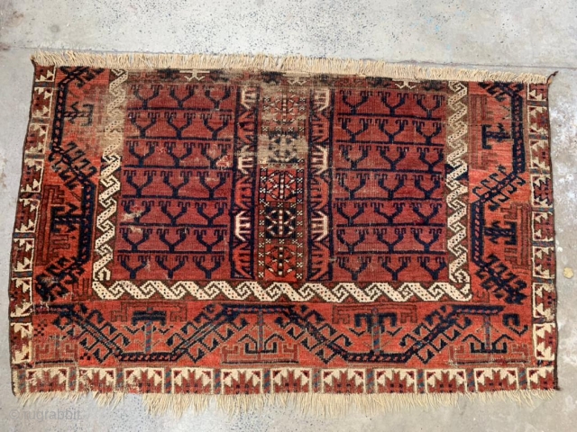 Antique Baluch ensi fragment. Very interesting with Ersari, Yomut, and Tekke features in a Baluch rug. 2'1" x 3'5"              