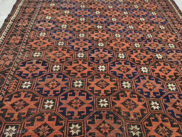 Antique Baluch rug with intact kilim ends. Memling gul design. Beautiful colors and indigo blue. Reasonable price. 6ft 7in x 3ft 8in

Let me know if you'd like additional photos.

Cheers!    