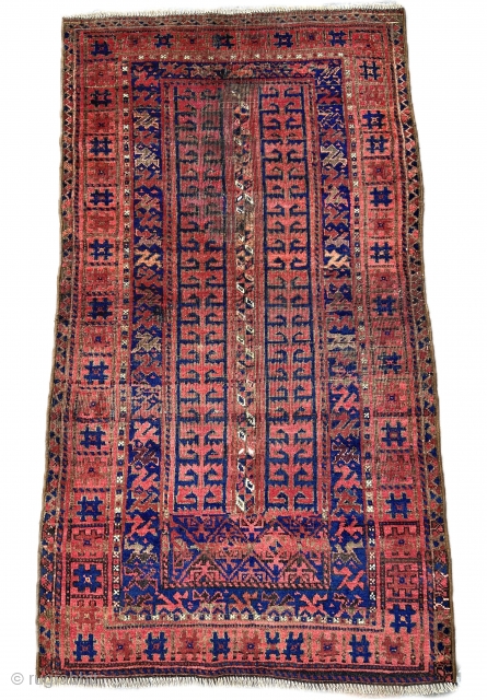 Interesting antique Baluch rug. Natural dyes. Much to enjoy about this piece.

5'2" x 2'10"                   