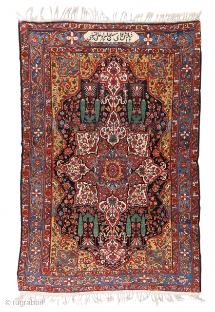 An important Bakhtiary Khan carpet signed: "Commissioned by Mister Soltan Morad Khan of Bakhtiary  1312”. Size 239 x 159, in very good condition.         