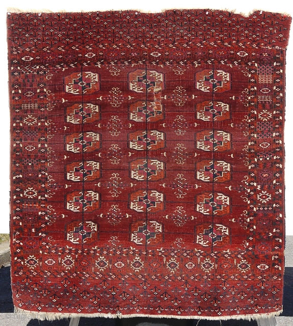 Antique Turkmen Tekke Khali wedding rug. Approx. 48 X 42 inches 122 X 107 cm).
 Last quarter 19th c. Wool on wool, with good colours and soft abrash. Sparing use of cochineal.  ...