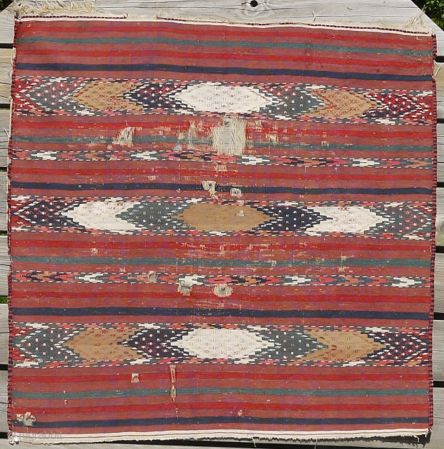 This is a particularly rare and  fine example of a type of Turkman rug, the function of which is uncertain. It can bwe recognized as a brides's rug for her wedding  ...