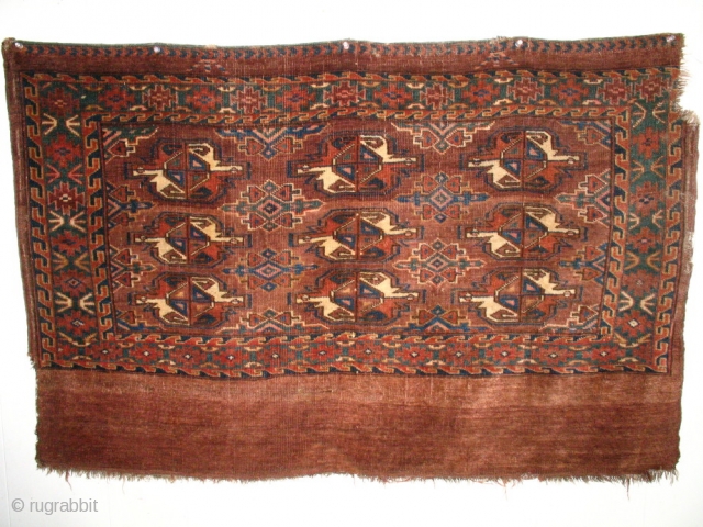 Turkmen - Yomut /  Igdyr, 9 gul chakmak motif with secondary erre  guls in between. Wonderful abrash; velvety wool; with abundant  blue-green colour in the field and border. There  ...