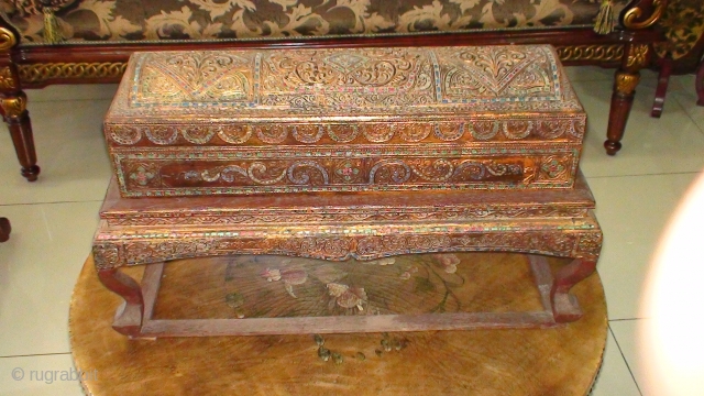 A 19thCentury, Konbaung period, Burmese Kamawaca (Religious text) Box complete with Support Stand. Lacquered and Gold-gilt with coloured mirror-glass inlay . "Thayoe" relief design. Made either with Burmese Teak wood and/or Burmese  ...