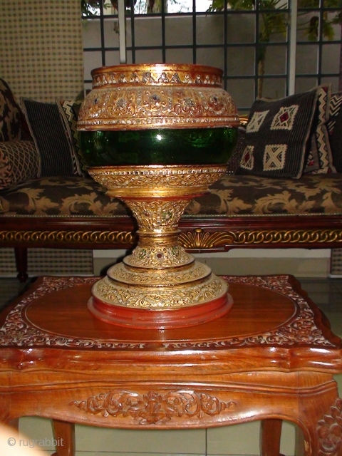 A 3-piece, early 20thCentury Burmese "Hsun-oke" with Glass Bowl (Food Carrier used in collecting Alms). Bamboo Top and Base sections, Lacquered and Gilded with coloured mirror-glass inlay.
Provenance: Likely crafted in Bagan before  ...