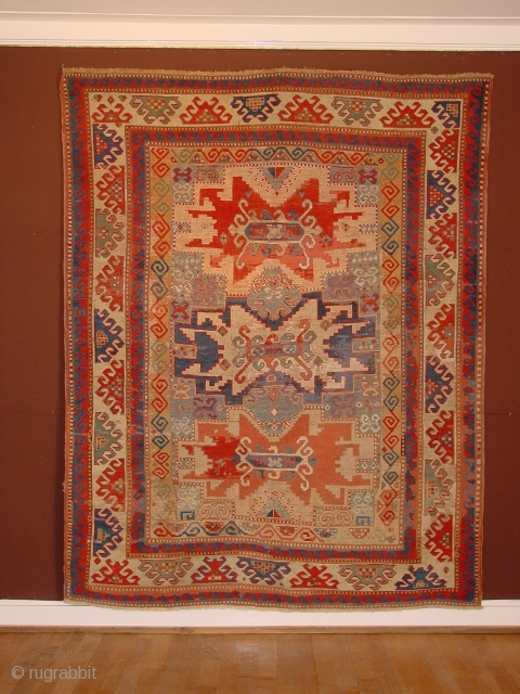 very old kazak, ca 1850, great size 166x212cm  5.5x7.1ft, all ends, beautifully secured, impressive design, great natural colors, the wool used for repiling is faded, 
the rug is clean and ready  ...