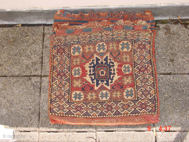 wonderful complete 1880 sumakh caucasian lesghhi bag , the white is cotton, ,no stains, no holes in the frint, no repairs in the front, wonderful natural colors, certainly inside, maybe a wash

wonderful  ...