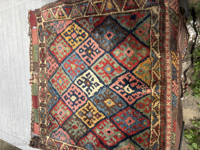 Gorgeous 1880 Jaff Kurdish full pile bag. With a gorgeous palet of fantastic all natural colors.
Original selvedges and good ,no stains, no repairs . Original kelim back
The whole measures 64 x ...