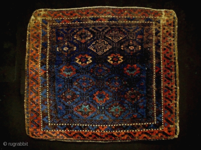 1880 Very Fine Baluch Bagface
Size: 64x56cm (2.1x1.9ft)
Natural colors (except one color at the star pattern is faded)
                